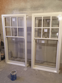 Sash-and-case windows painted, glazed and read to go.